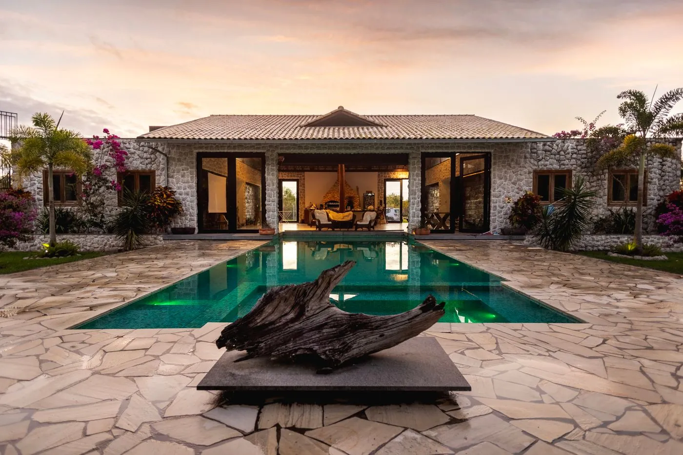 A new house on Shore House with a pool terrace at sunset